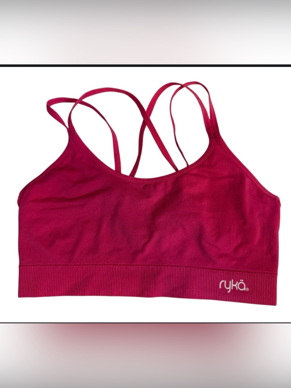 ryla pink sports bra features a multi-strap crisscross back design sz(m)
